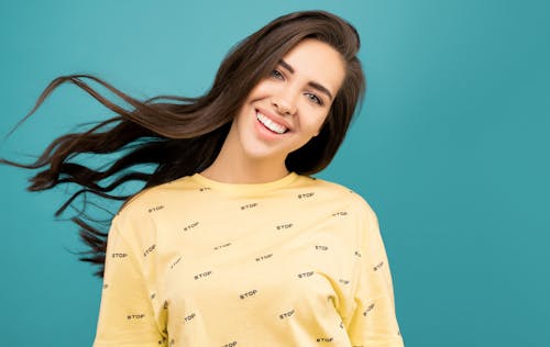 Free Photo of Woman In Yellow Shirt Stock Photo