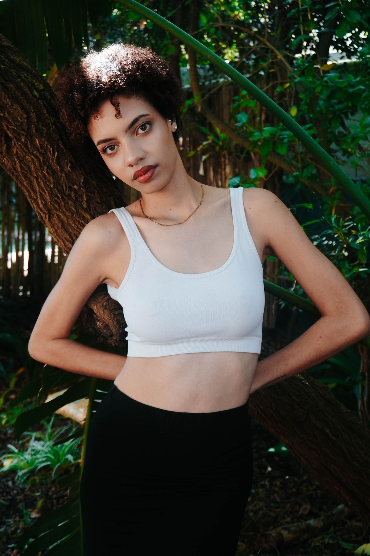 Woman Posing in Nature Wearing White Top · Free Stock Photo