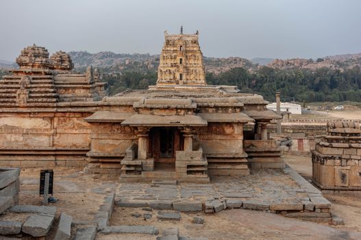 Ancient temple structure in Hampi, Karnataka, India showcasing historic architecture.