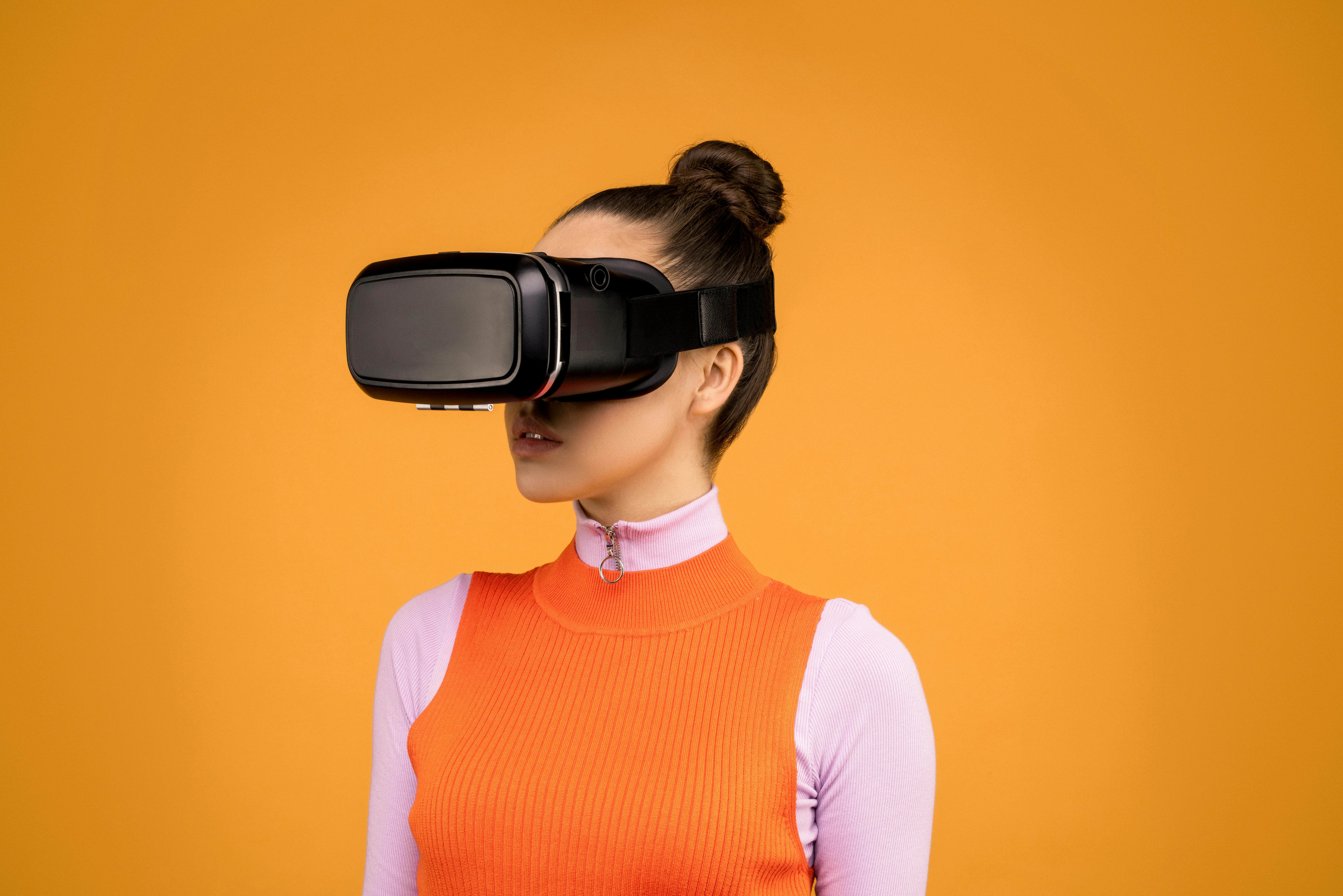 Woman Using Virtual Reality Goggles Free Stock Photo