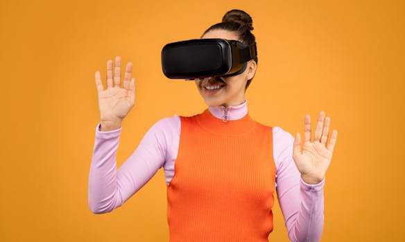 Excited woman using virtual reality headset against vibrant orange background, showcasing modern technology.