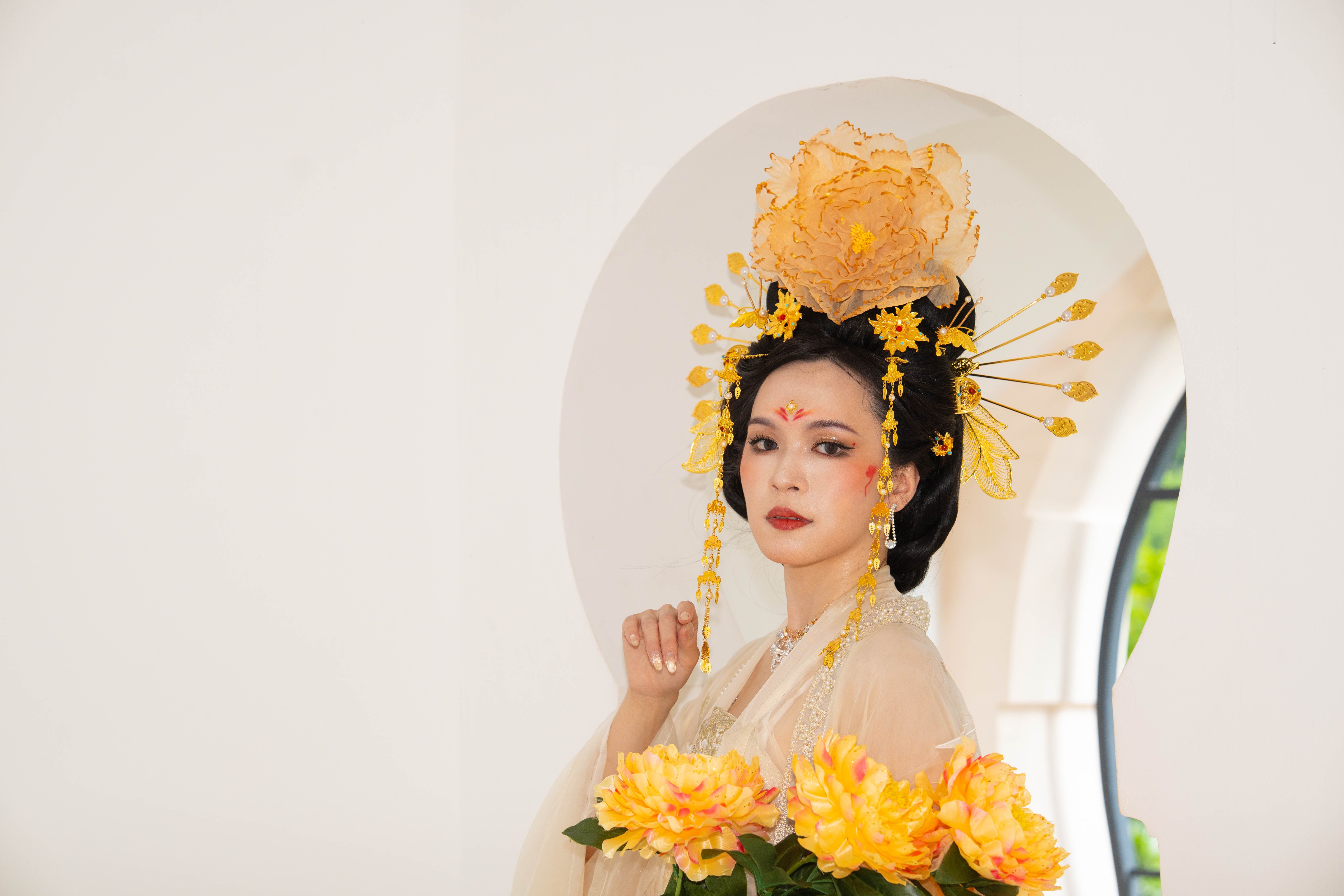Elegant Portrait of Woman in Traditional Attire · Free Stock Photo