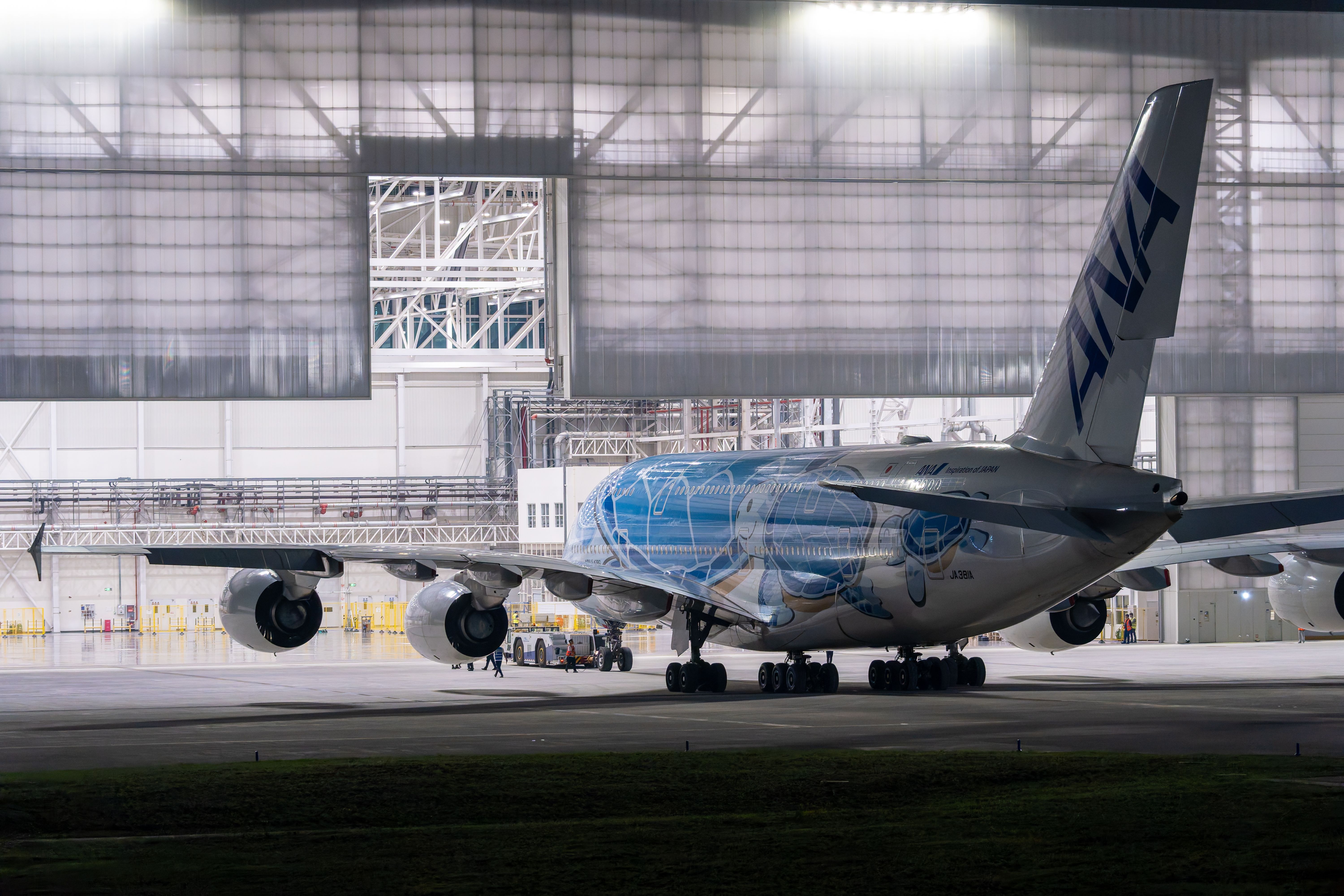 Engineers analyzing aircraft design data during a project