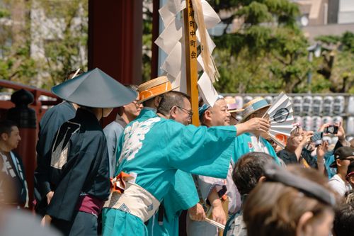 Free People in traditional costumes celebrate a festival outdoors in Tokyo. Stock Photo