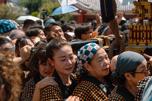 Free Crowd of people in traditional attire at a festival in Tokyo, Japan, under sunny skies. Stock Photo