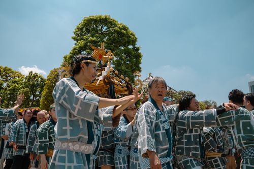 Free Vibrant scene of a traditional Japanese festival parade in Tokyo, capturing cultural heritage and community spirit. Stock Photo