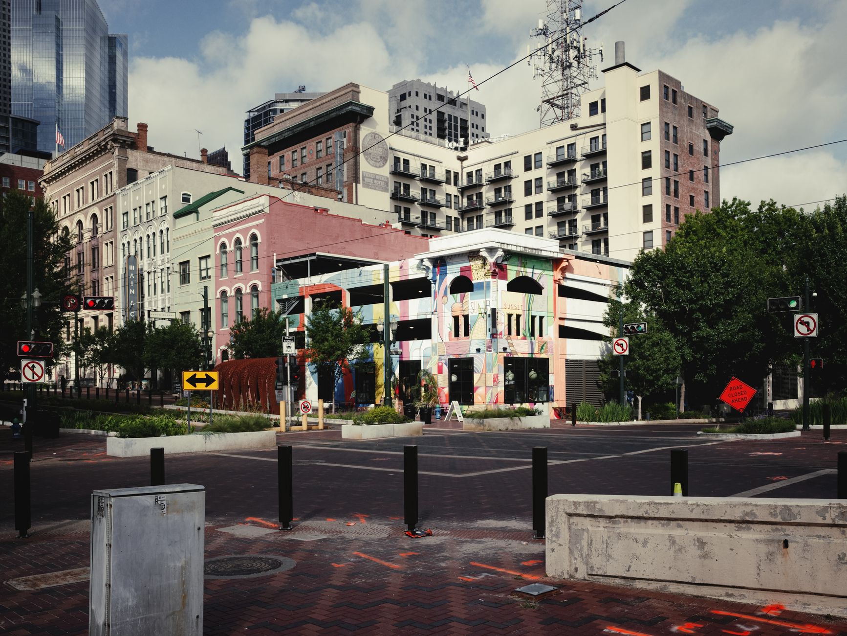 Vibrant street view of downtown Houston, showcasing colorful architecture and urban design.