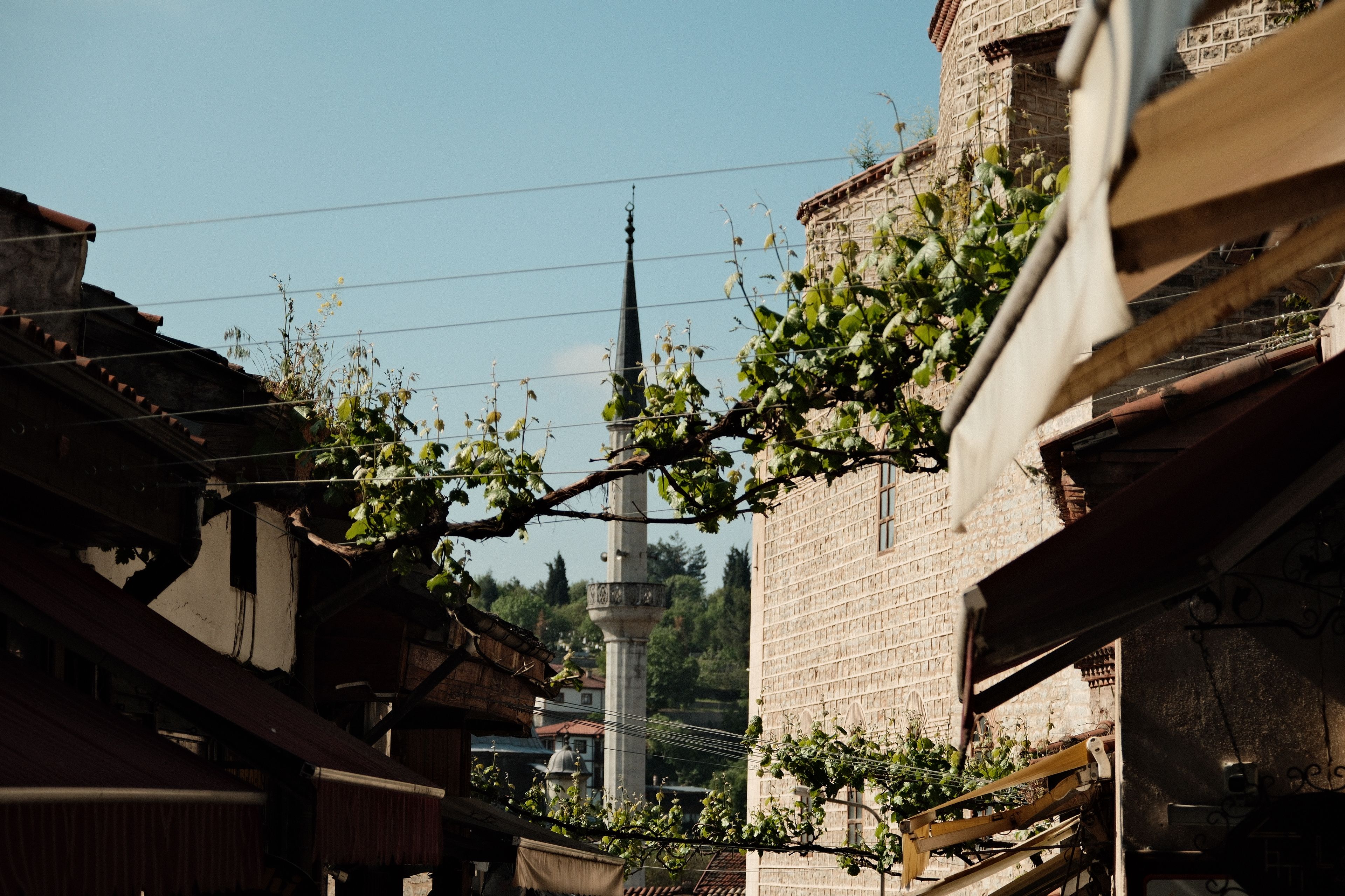 Charming Alley View with Minaret in the Distance · Free Stock Photo