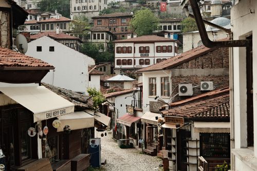 Free Narrow street in Safranbolu, Turkey, showcasing traditional Ottoman architecture and quaint shops. Stock Photo