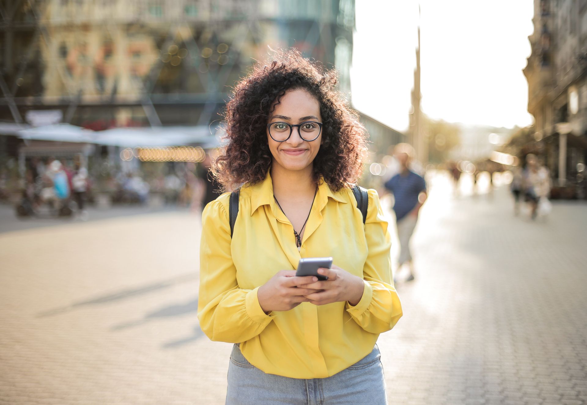 Photo of Woman Holding Mobile Phone