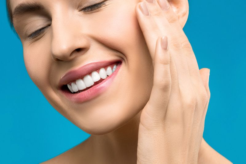 A patient smiling after treatment