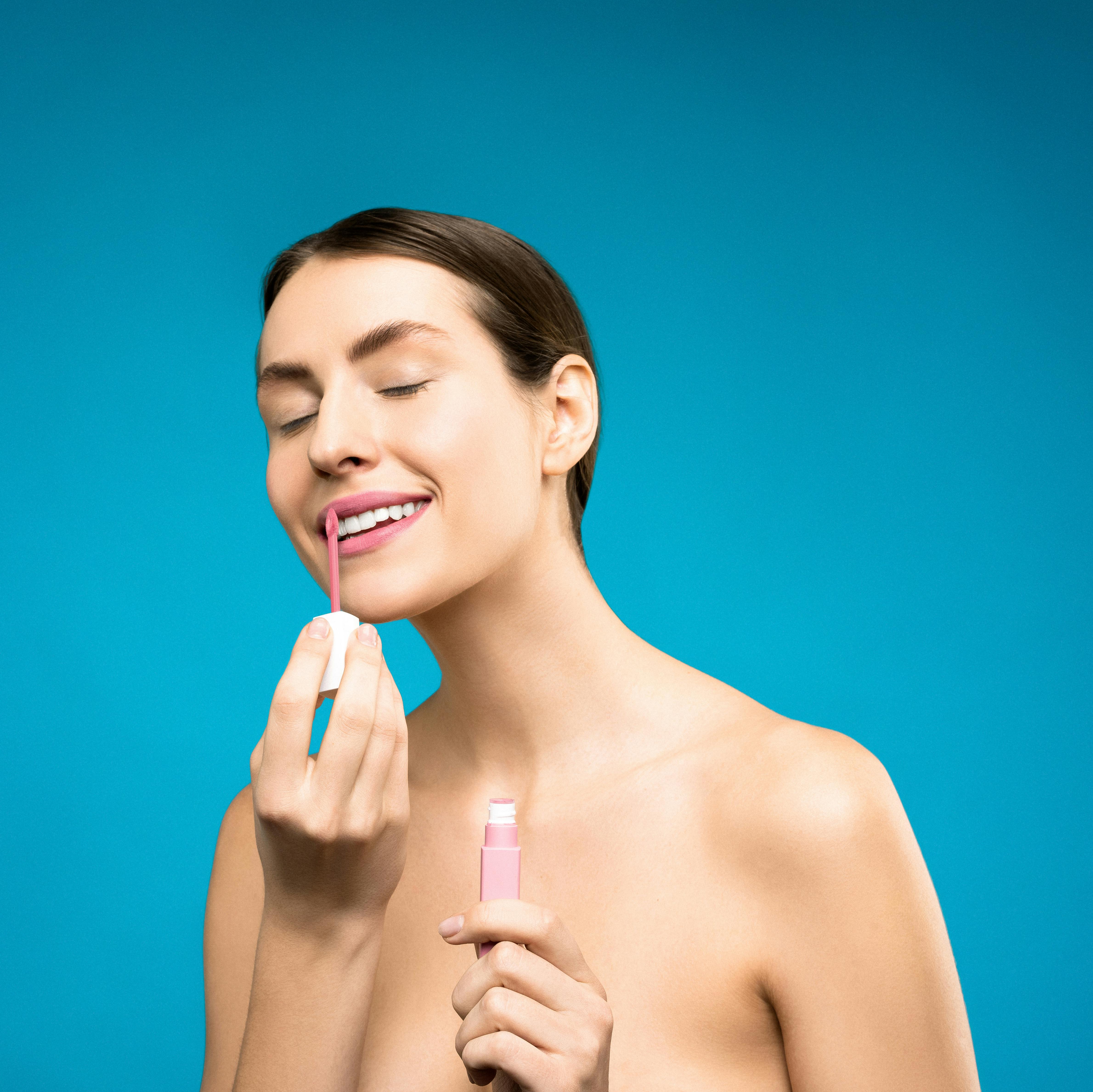 woman with pink lipstick