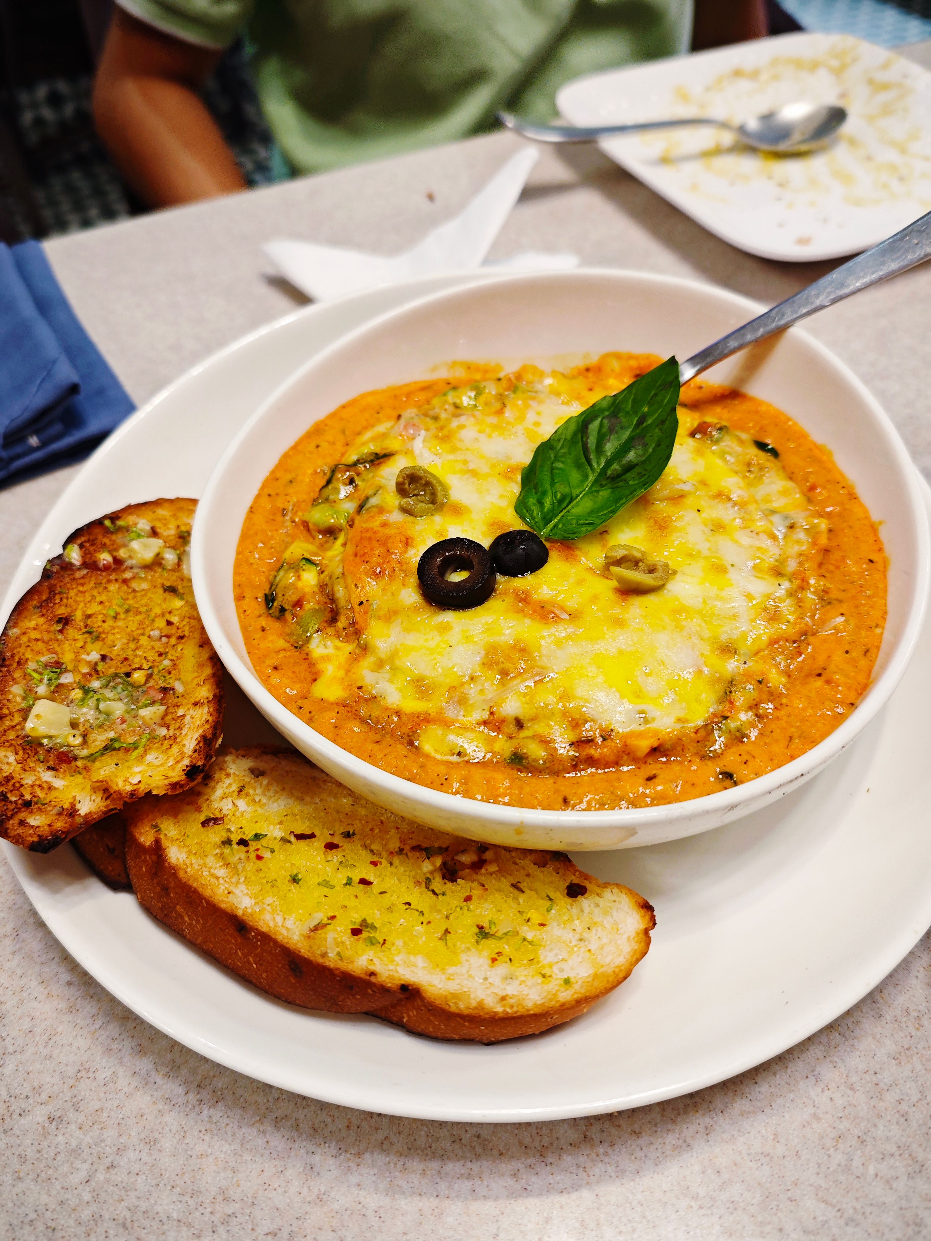 Lasagne served with garlic bread