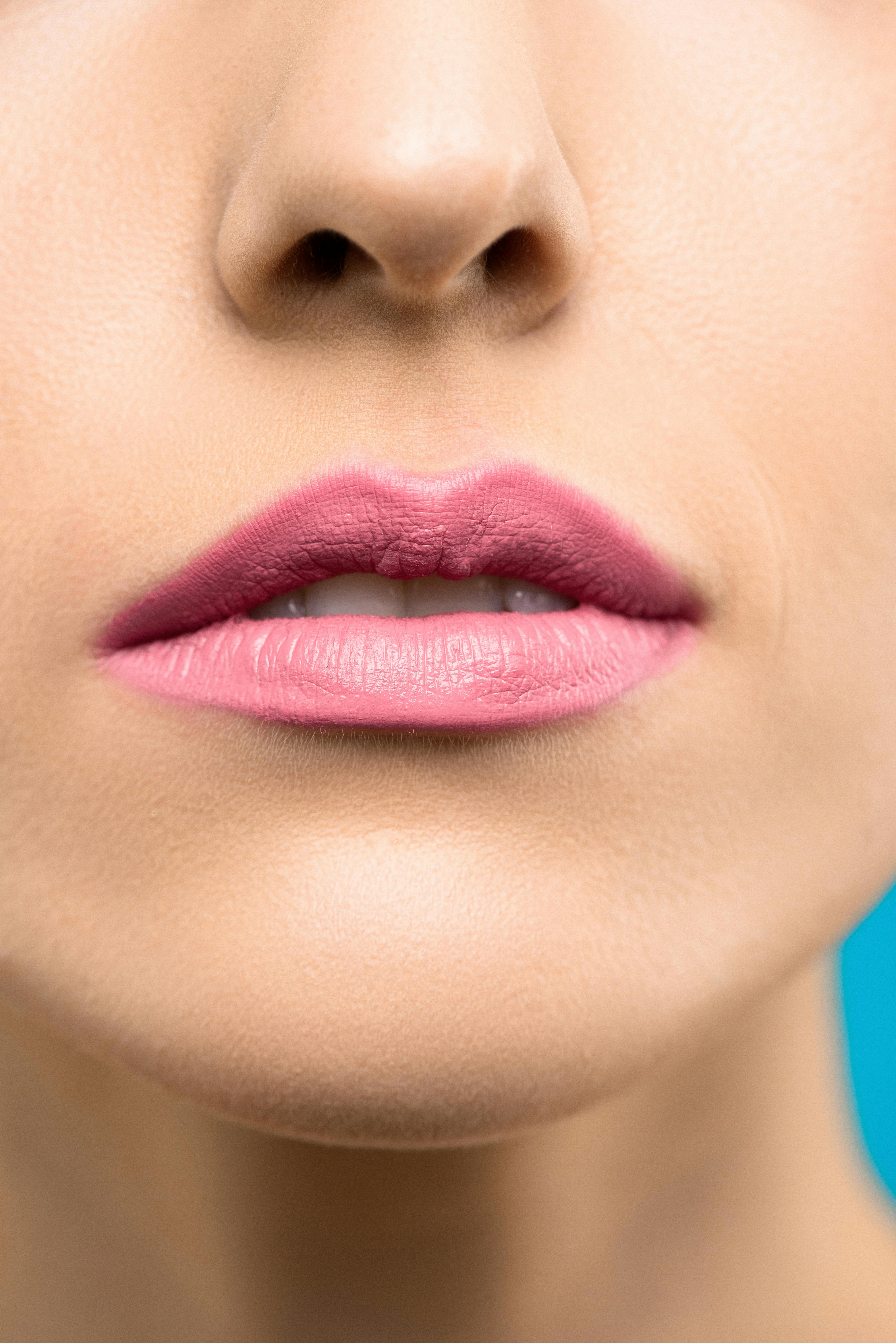 woman with pink lipstick