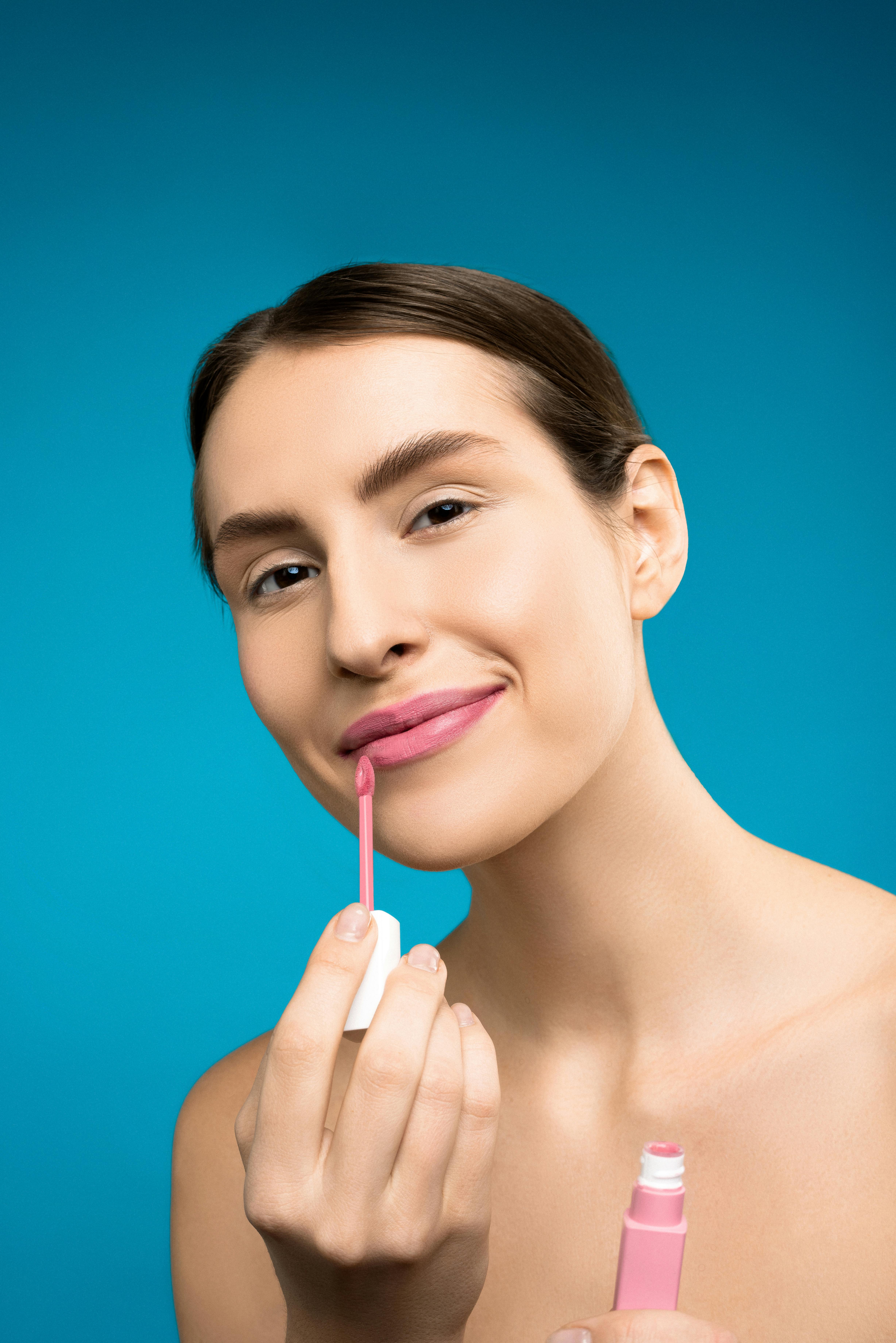 woman with pink lipstick