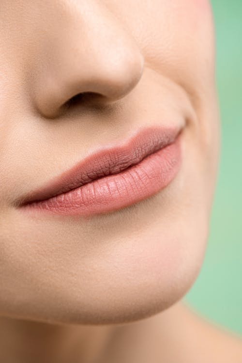 Close Up Photo of Woman's Lips