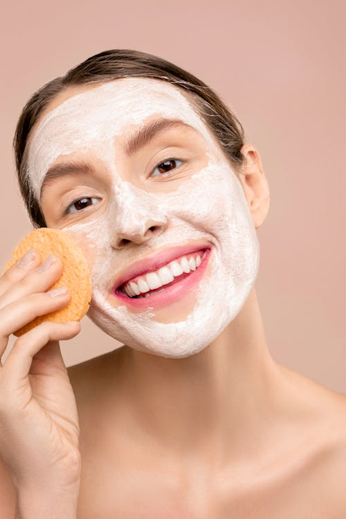 Free Woman Washing Her Face Stock Photo
