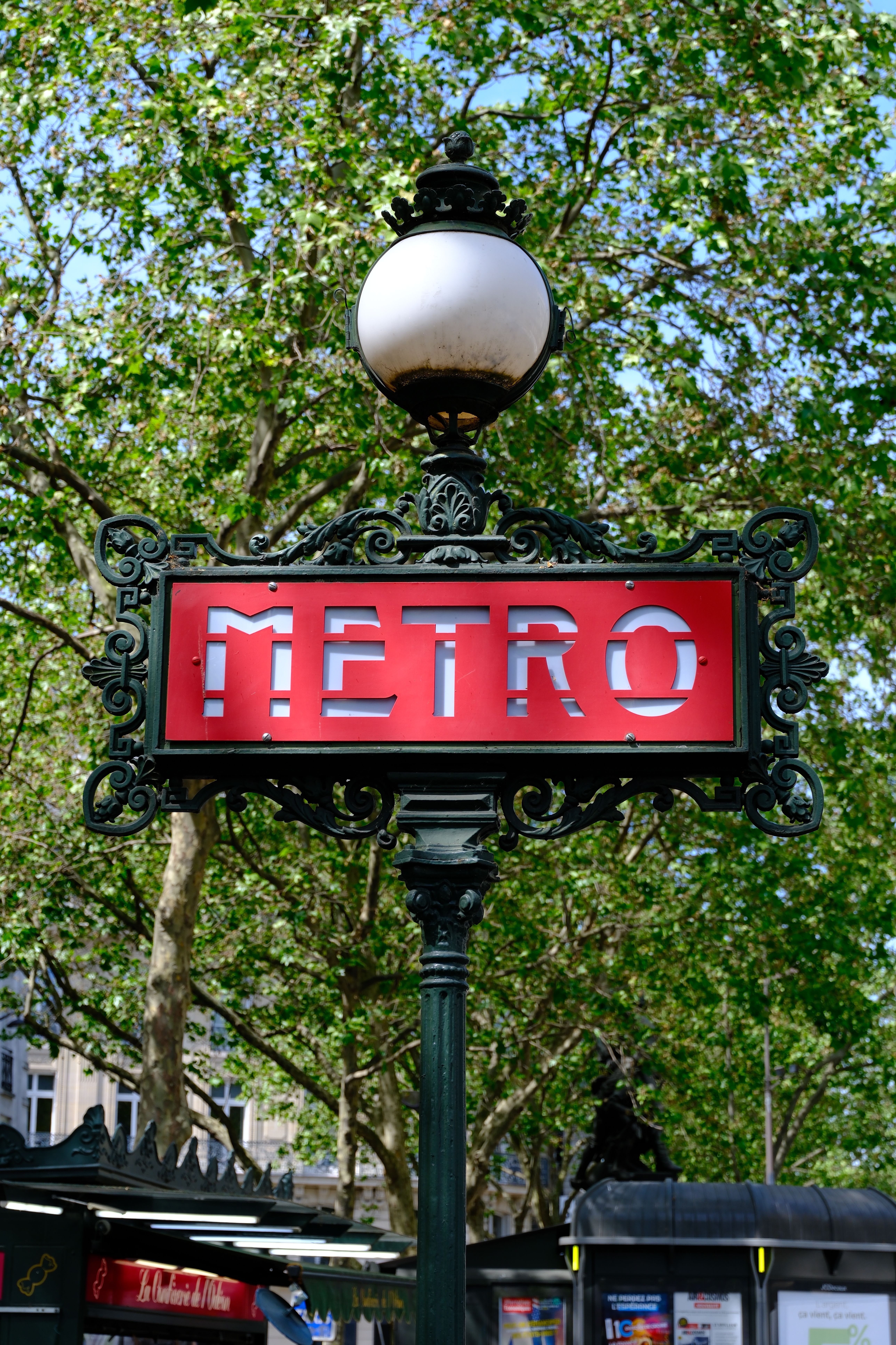 Iconic Metro Sign in Paris, France · Free Stock Photo