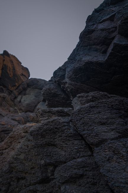 Close-up view of eroded rocks at twilight in Melbourne, creating a dramatic natural landscape scene.