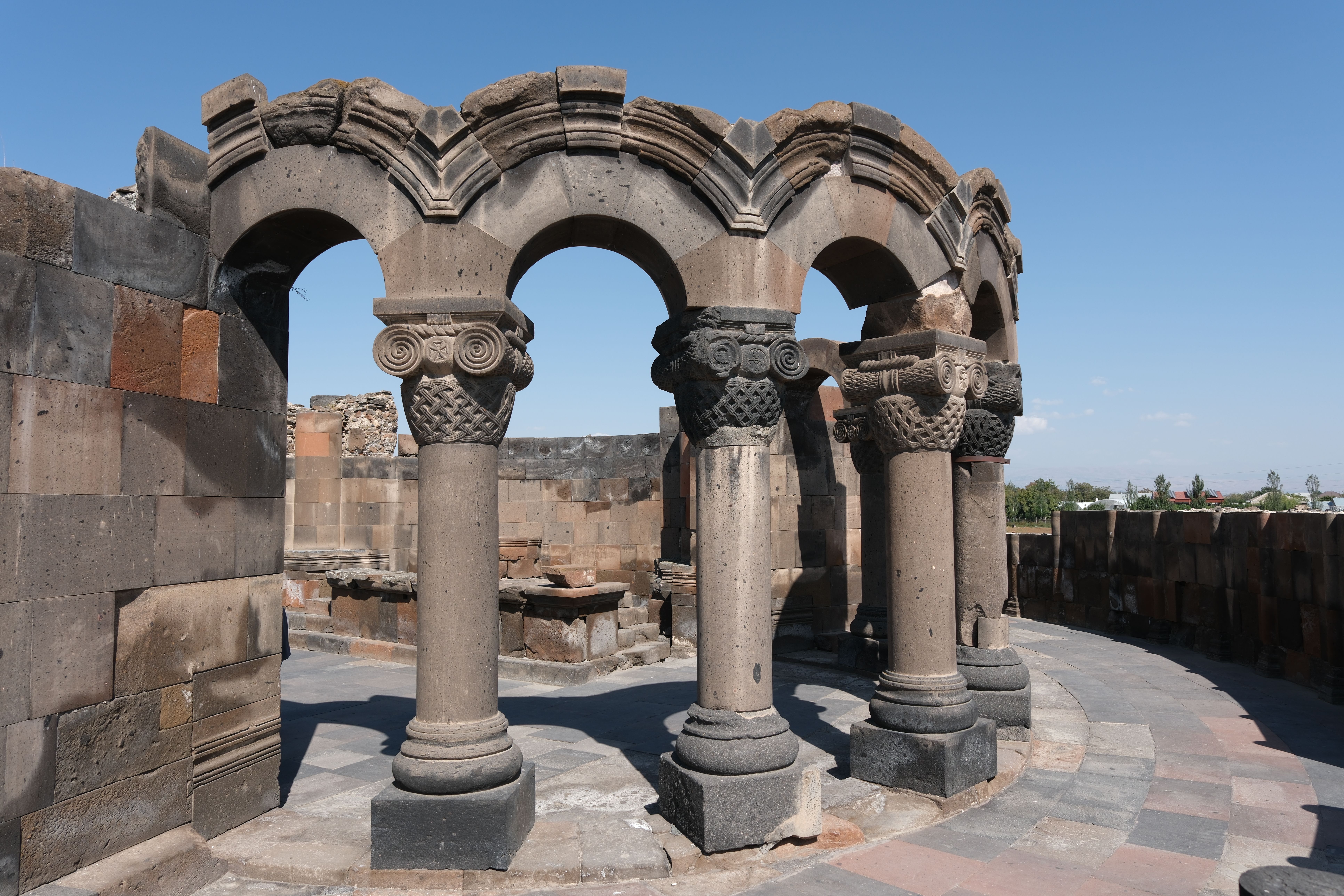 Ancient Romanesque Columns under Clear Blue Sky · Free Stock Photo