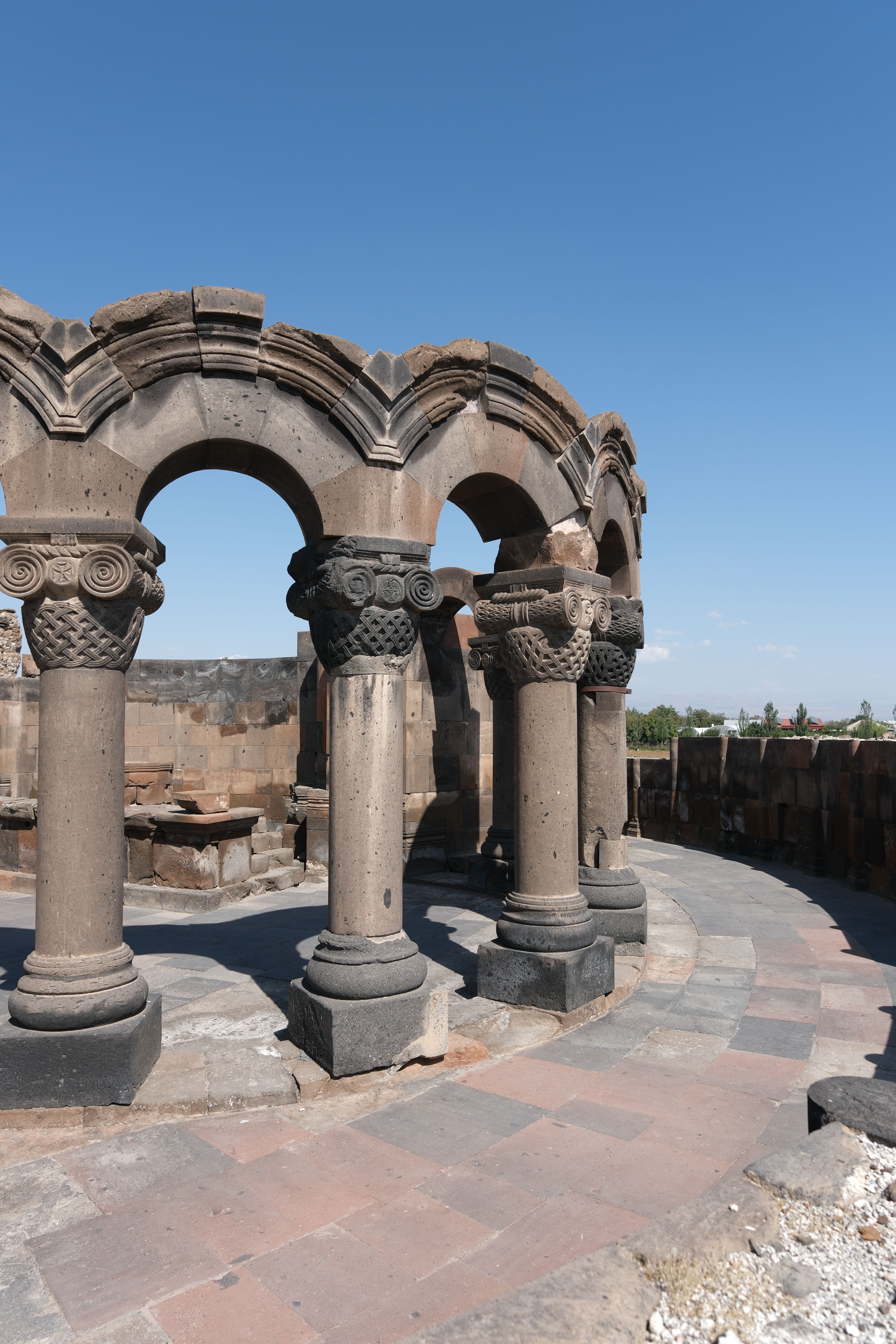Ancient Stone Columns under Clear Blue Sky · Free Stock Photo