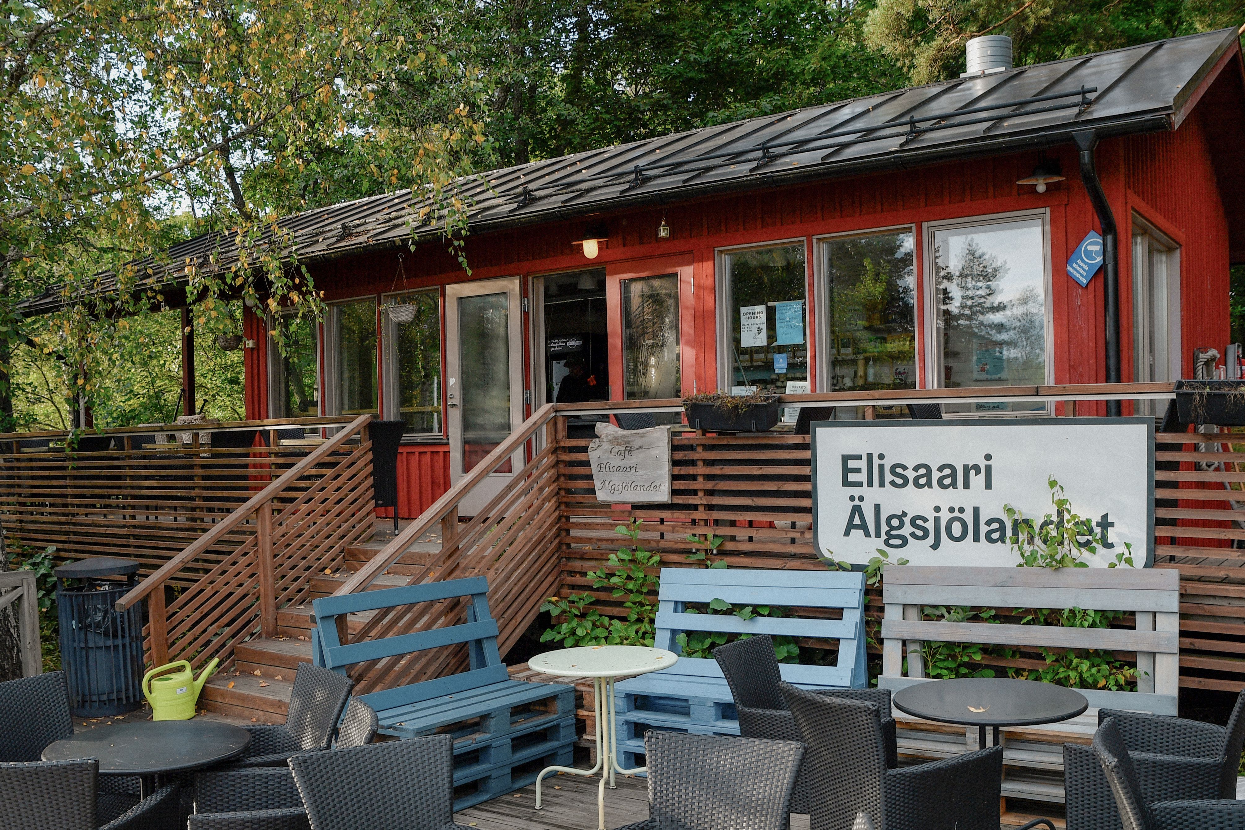 Rustic red café in Uusimaa, Finland, offering a scenic countryside dining experience.