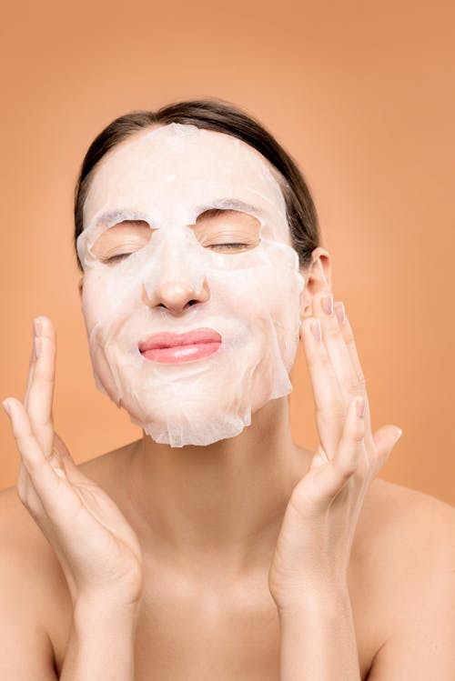 Free Woman With White Face Mask Stock Photo