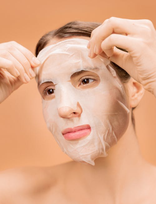 Free Person With White Face Mask Stock Photo