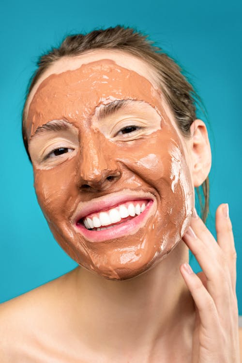 Woman With Clay Mask on Face
