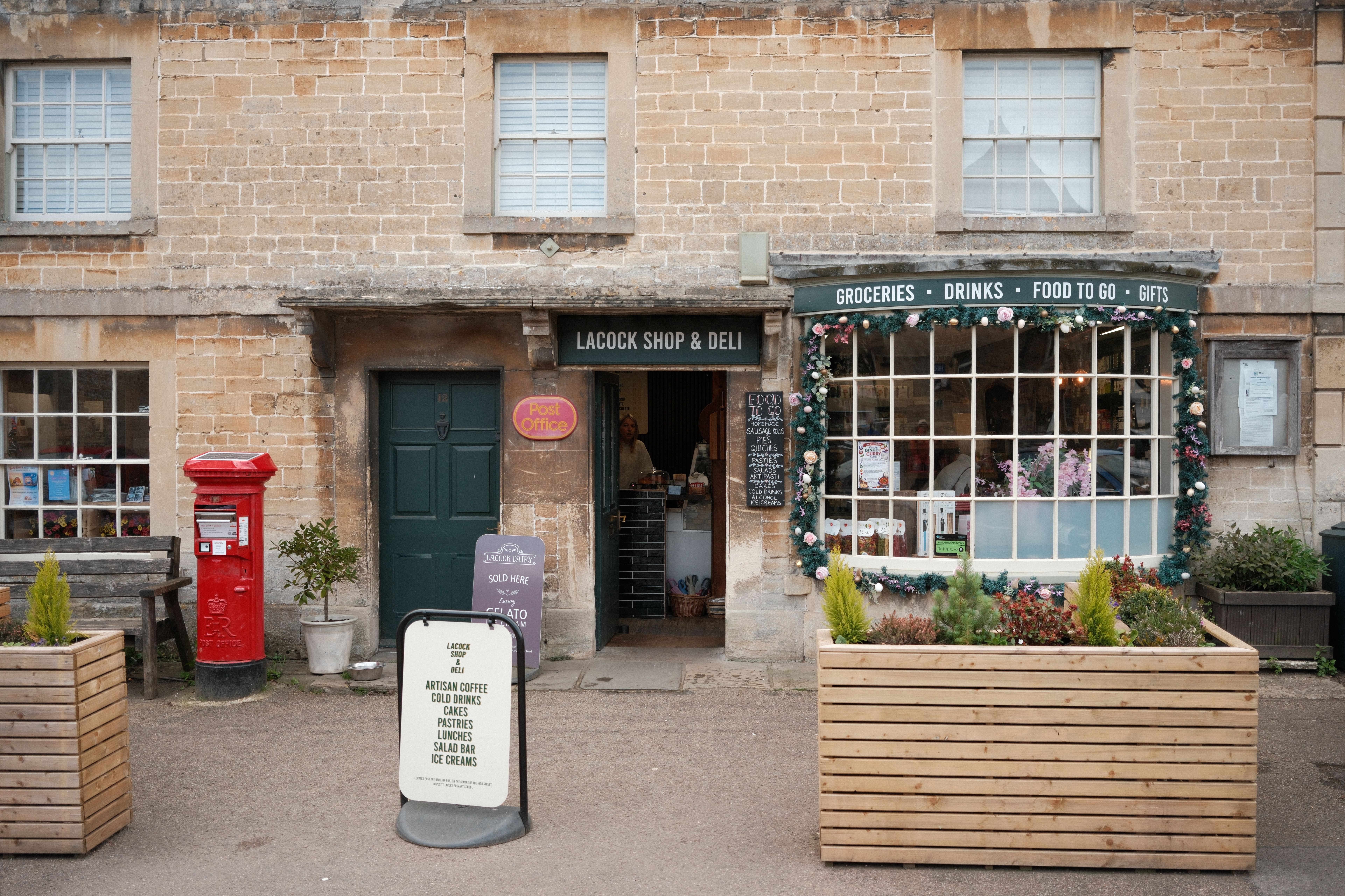 Discover the quaint Lacock Shop and Deli, a charming spot in Lacock, England, offering groceries and more.