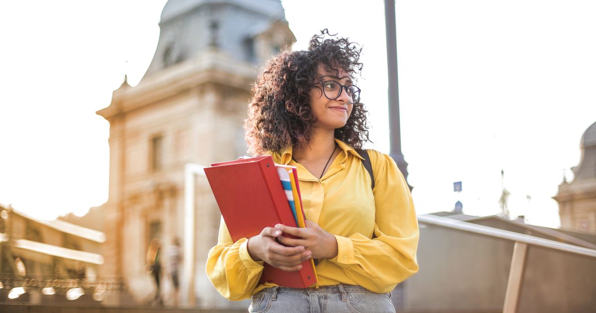 College student studying at a cafe