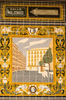 Intricately designed tile art depicting Calle Maldonado in Madrid, Spain with vibrant colors.