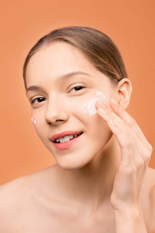 Free Woman With White Cream on Face Stock Photo