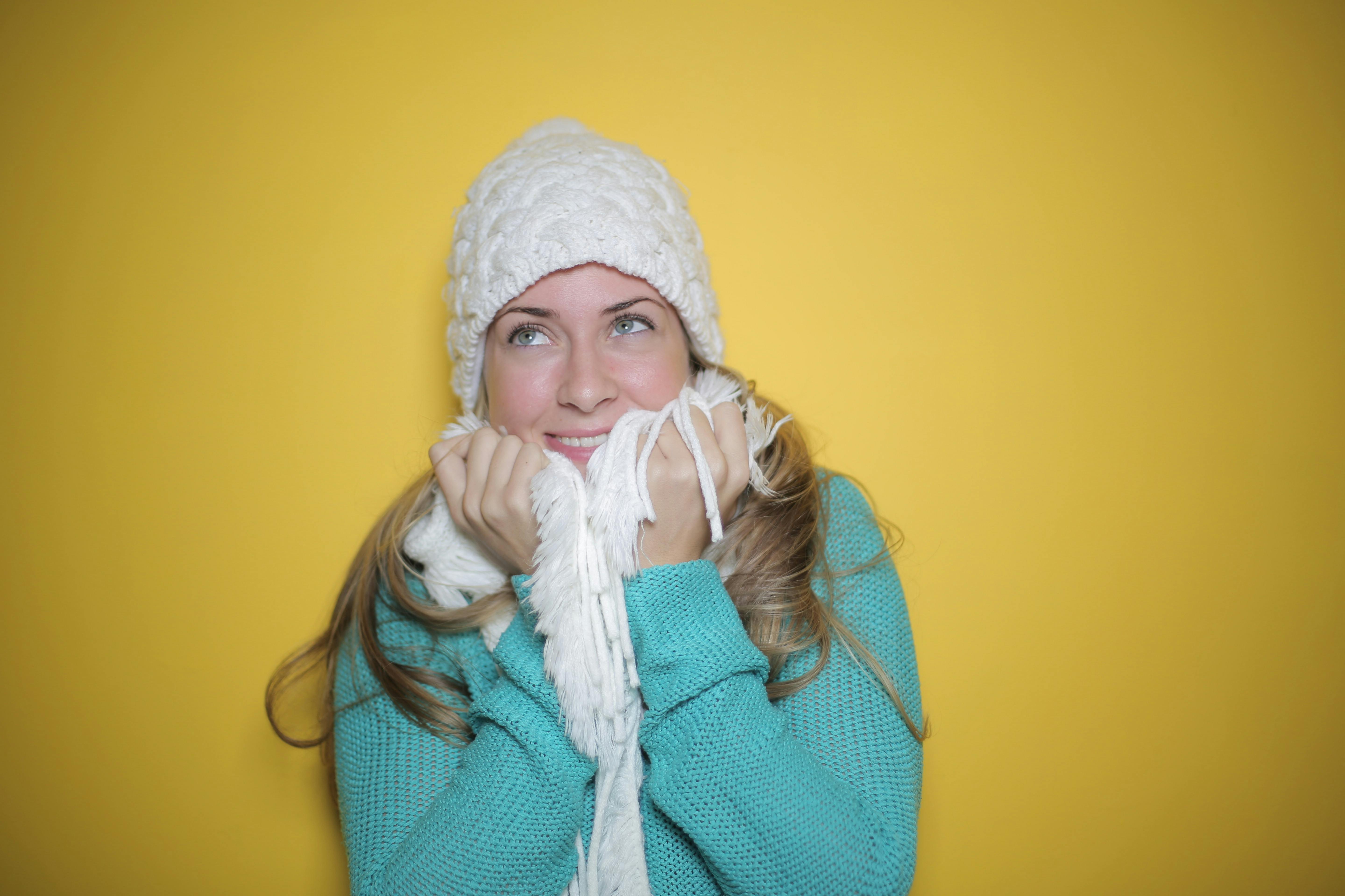 Portrait Photo of Woman in Blue Knit Sweater, White Knit Beanie, and ...