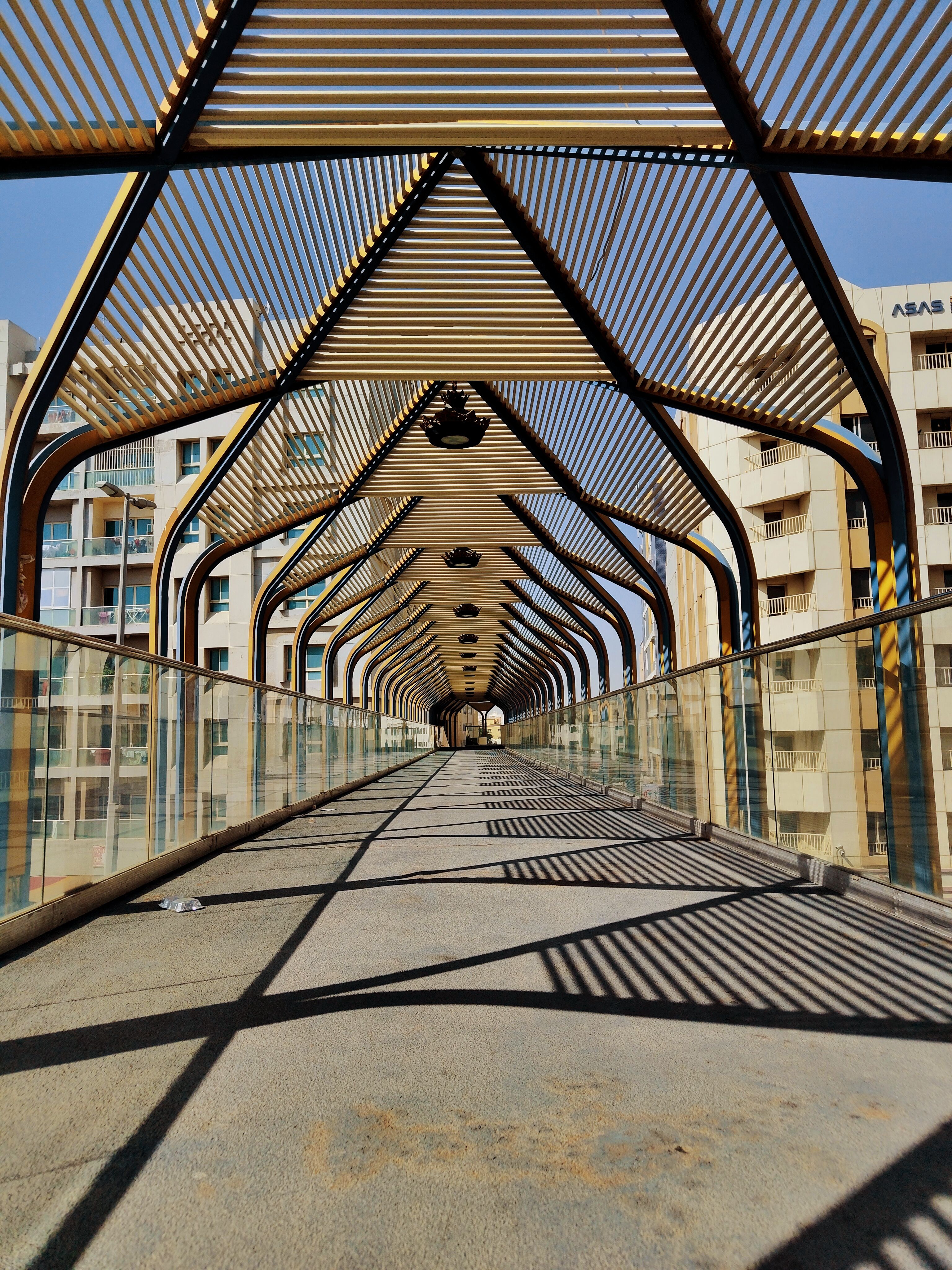 Modern Architectural Pedestrian Bridge · Free Stock Photo