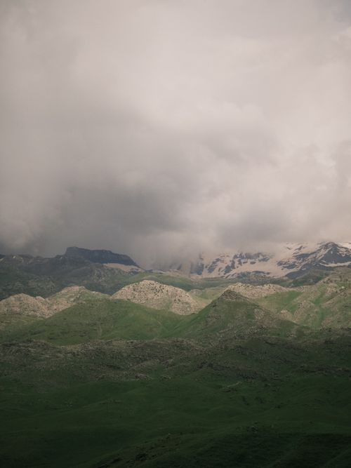 Free Majestic view of Kozluk's mountains under a dramatic cloudy sky, showcasing nature's beauty and power. Stock Photo