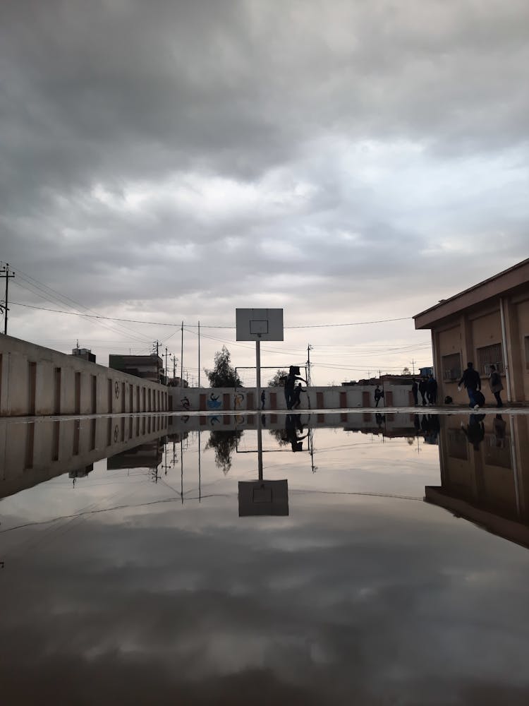 School Yard With Basketball Court On Overcast Day