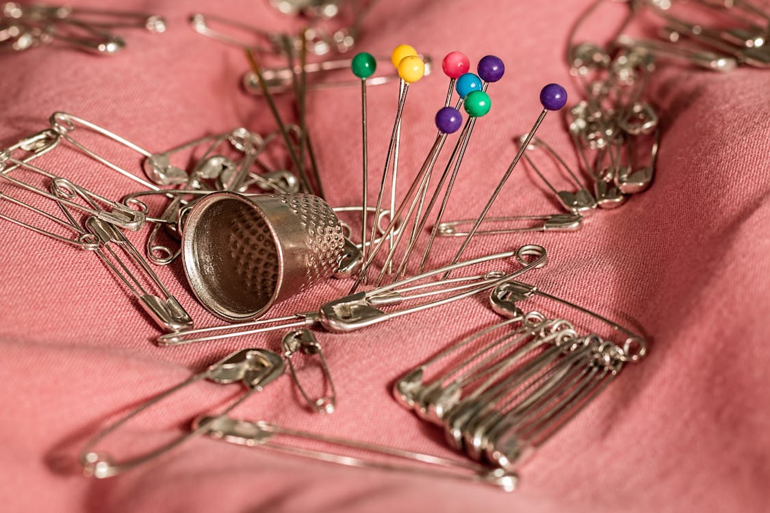 Free Green Yellow Red Needle Pin and Safety Pins Stock Photo