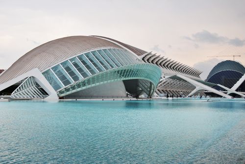 Free Explore the modern and iconic Hemisferic building with its reflective pools and futuristic design in Valencia, Spain. Stock Photo