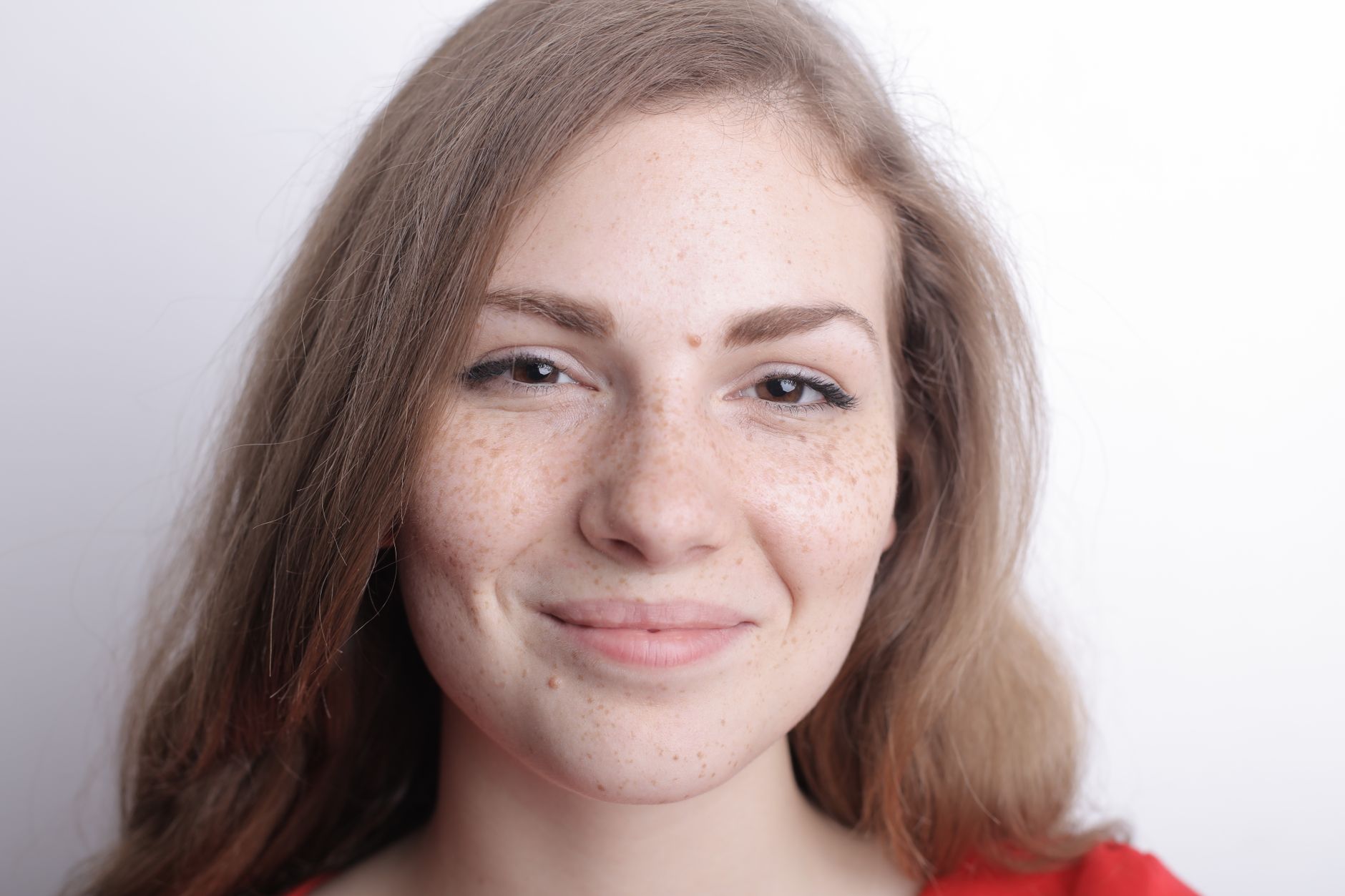 woman smiling eyes closeup