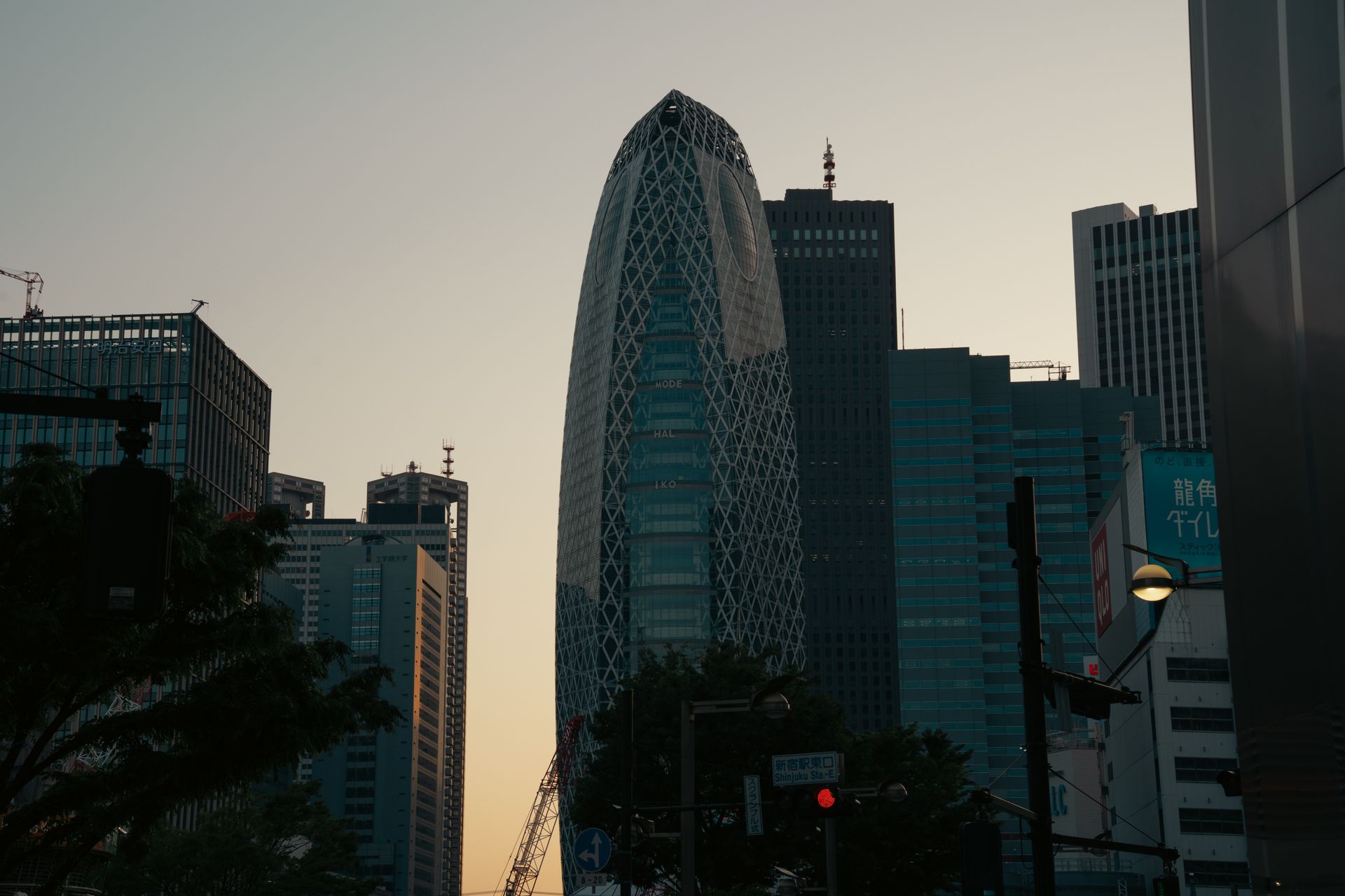 Tokyo financial district high-rises at dusk.