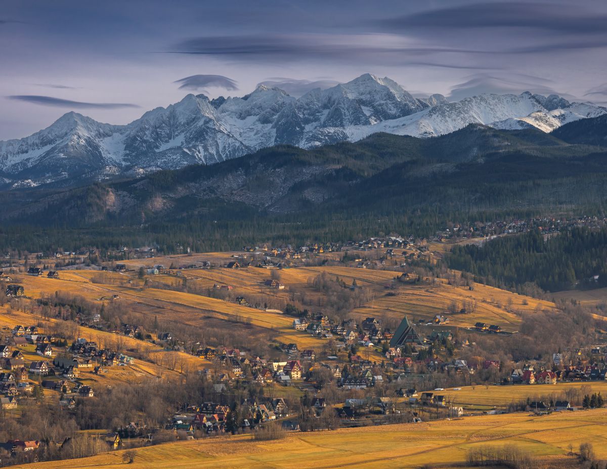 Autumn view over Zakopane with the Tatra Mountains behind the town