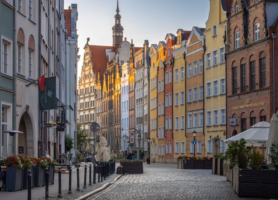 Beautiful Gdańsk street view with historic architecture at sunset, Pomeranian Voivodeship, Poland.