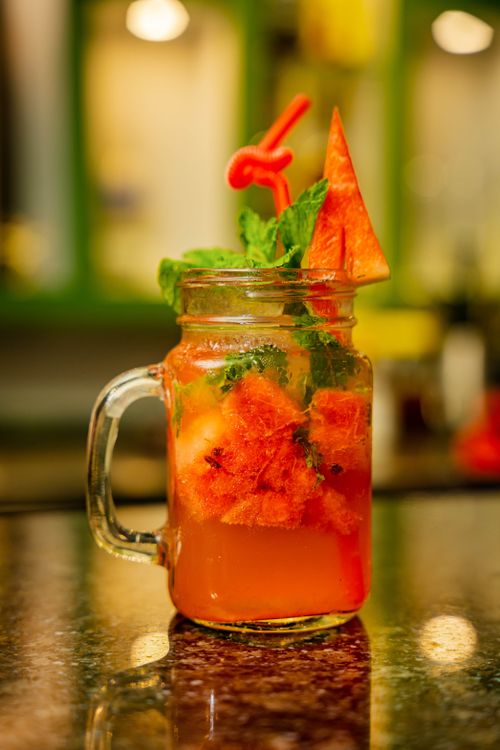 Free A vibrant, refreshing watermelon mint beverage served in a glass jar, perfect for summer. Stock Photo