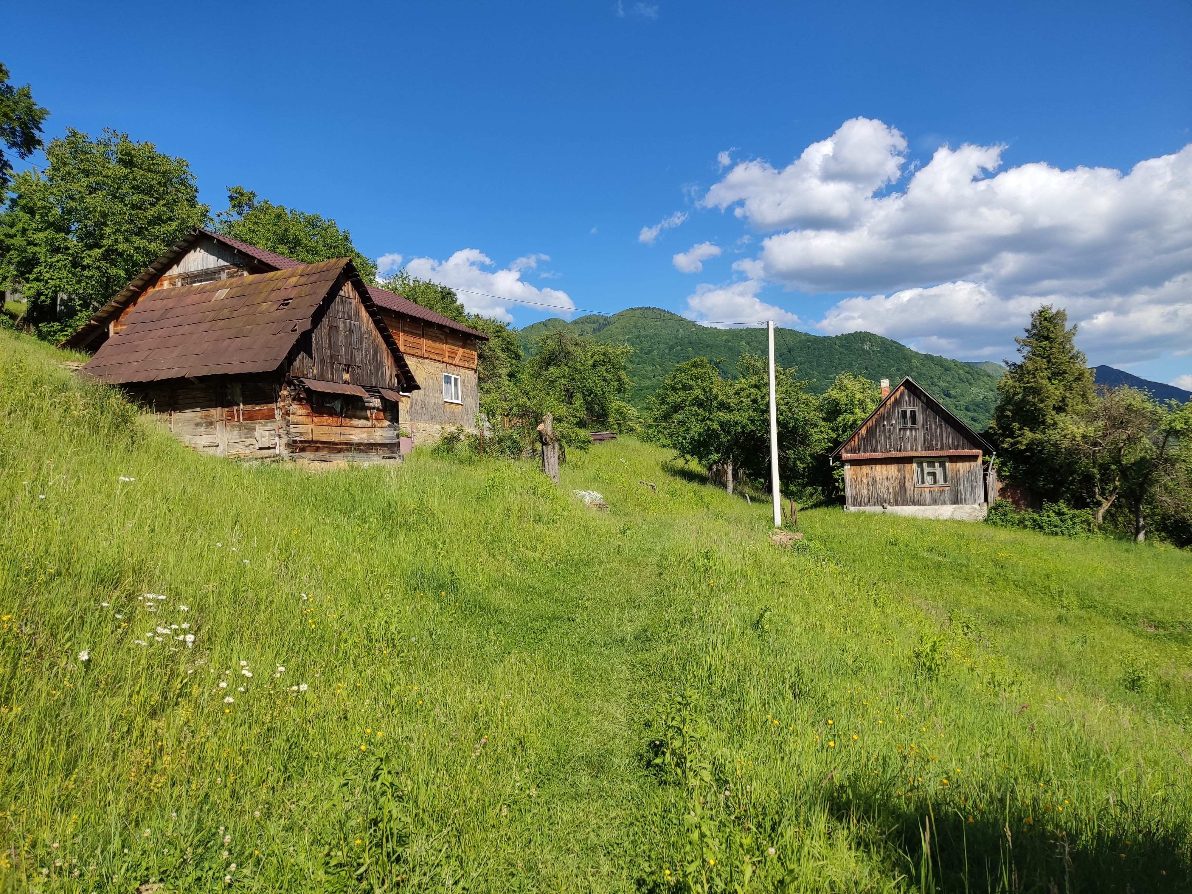 Dragalevtsi village houses on the lower slopes of Vitosha with the chairlift line above
