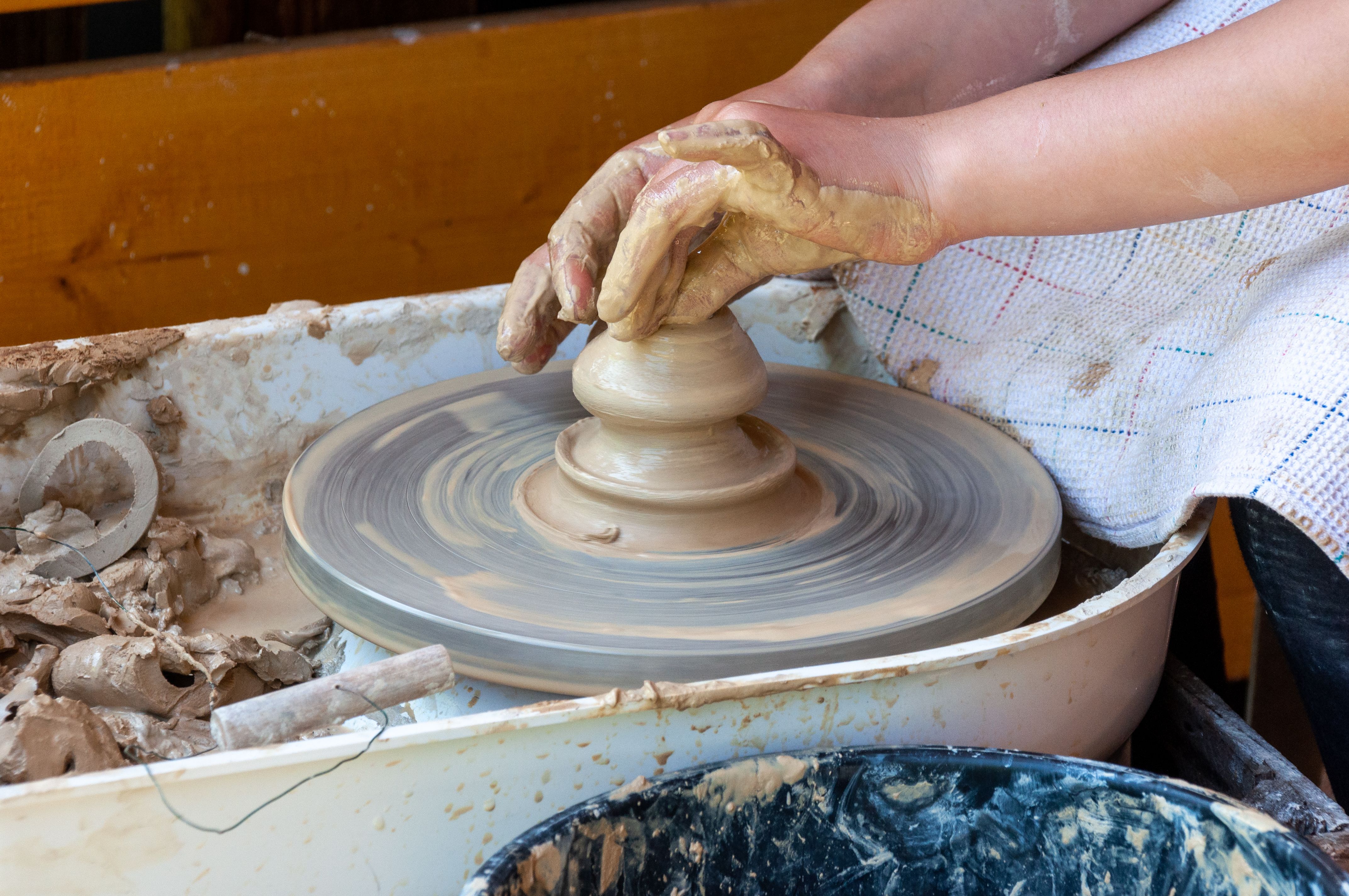 Handmade traditional ceramic items from Moldova displayed at a craft shop