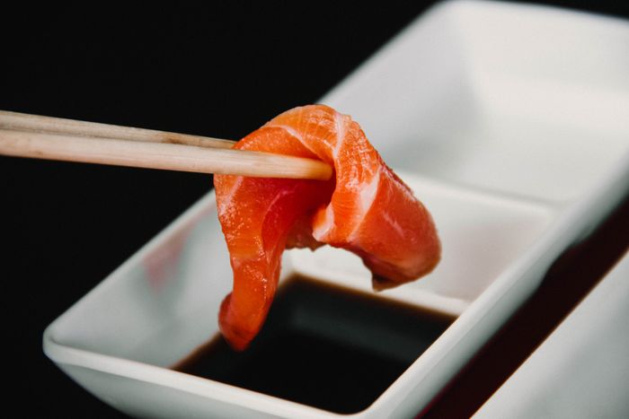 Salmon sashimi — wild salmon contains 4–5 mg astaxanthin per 100g, comparable to studied supplement doses