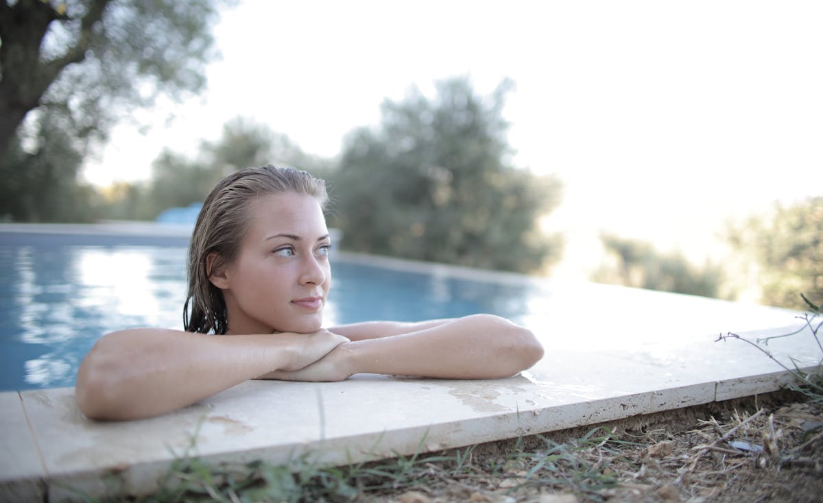 Baked Greek yogurt marinated chicken with vegetables in a pan