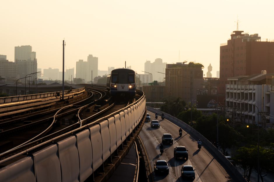 Modern Airport Rail Link train arriving at a station in Bangkok, Thailand