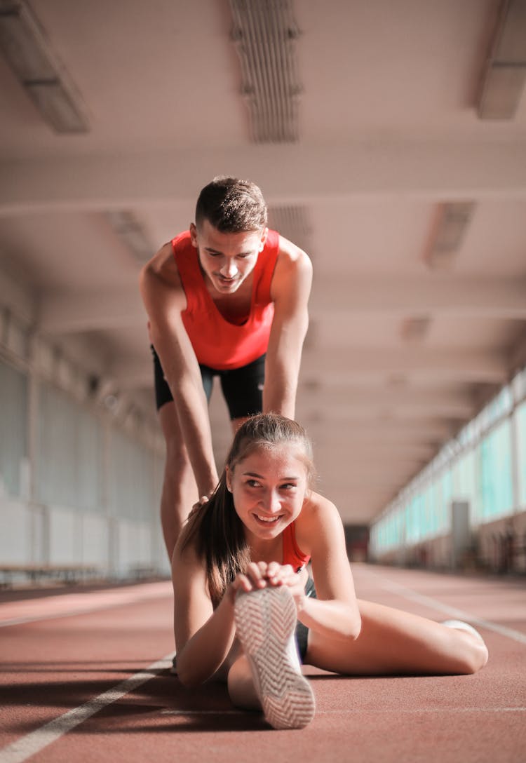 Young Runners Training Together At Gym